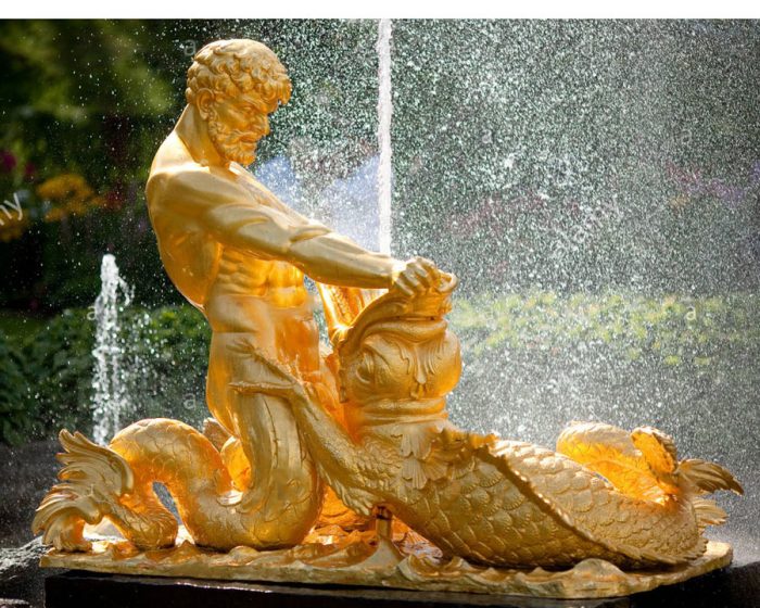 Famous gold covered fountain with triton hunting a sea serpent