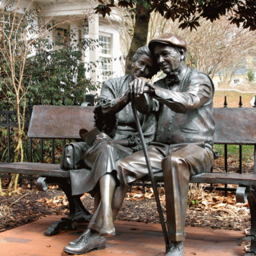 Famous bronze Valentine Statue of a old couple sitting on chair DZB-15