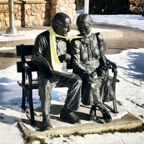 Life size elderly couple sitting on bench reading newspaper bronze statue DZB-76