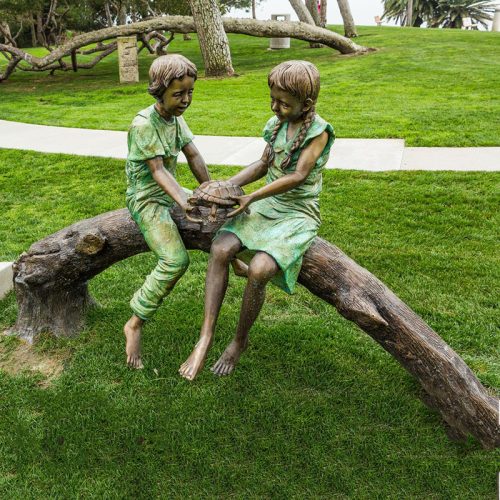 Life size two children sitting on a log bronze garden sculpture DZB-78