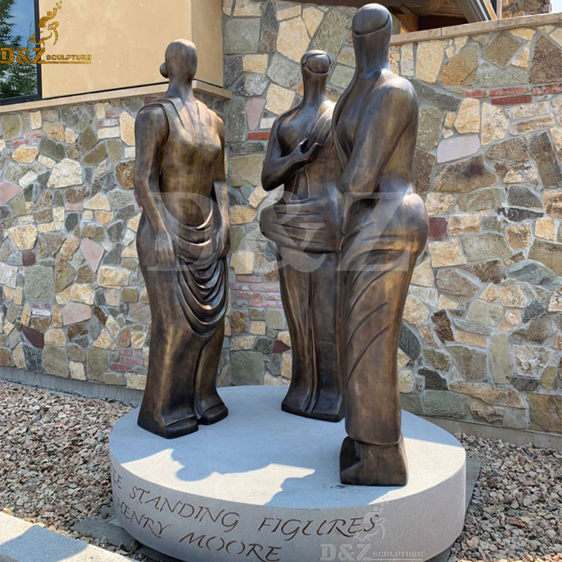 Famous three standing figures bronze statue by henry moore