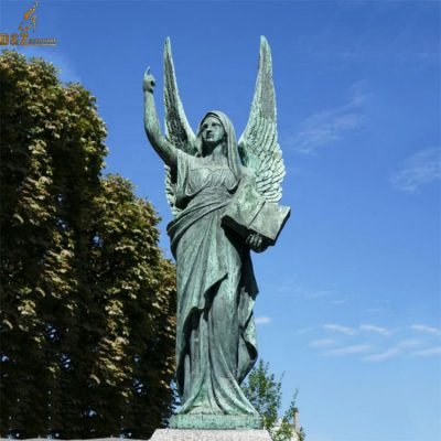 angel statue pointing to heaven